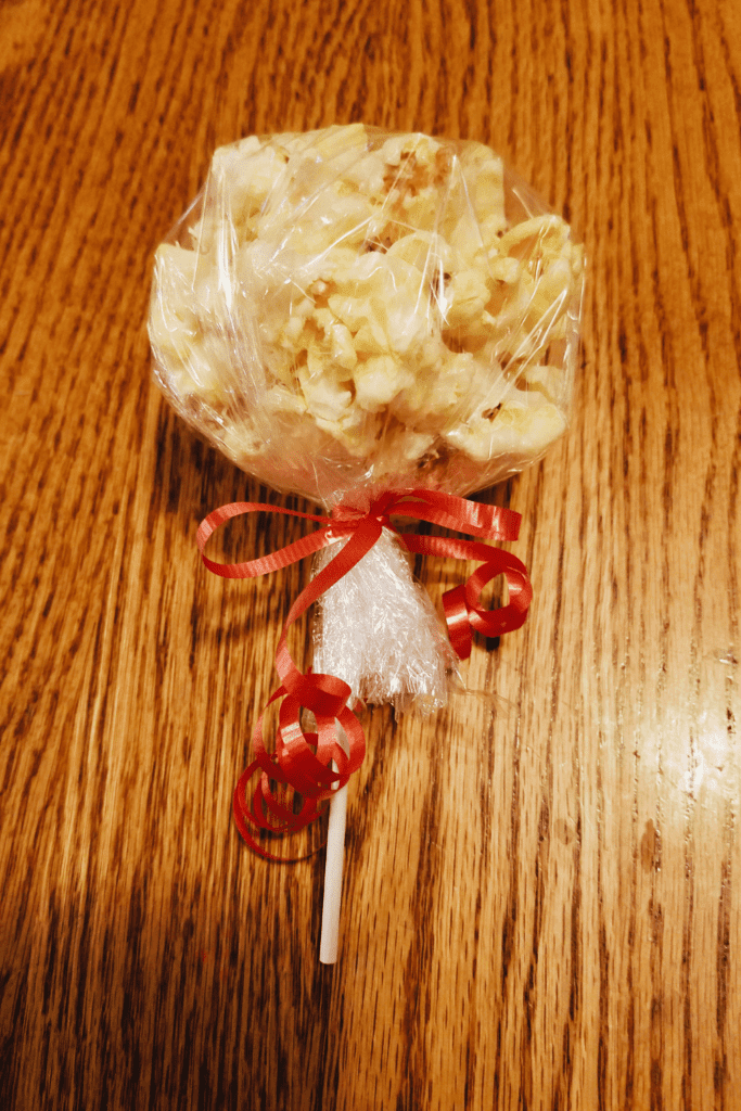 Popcorn ball on a stick.